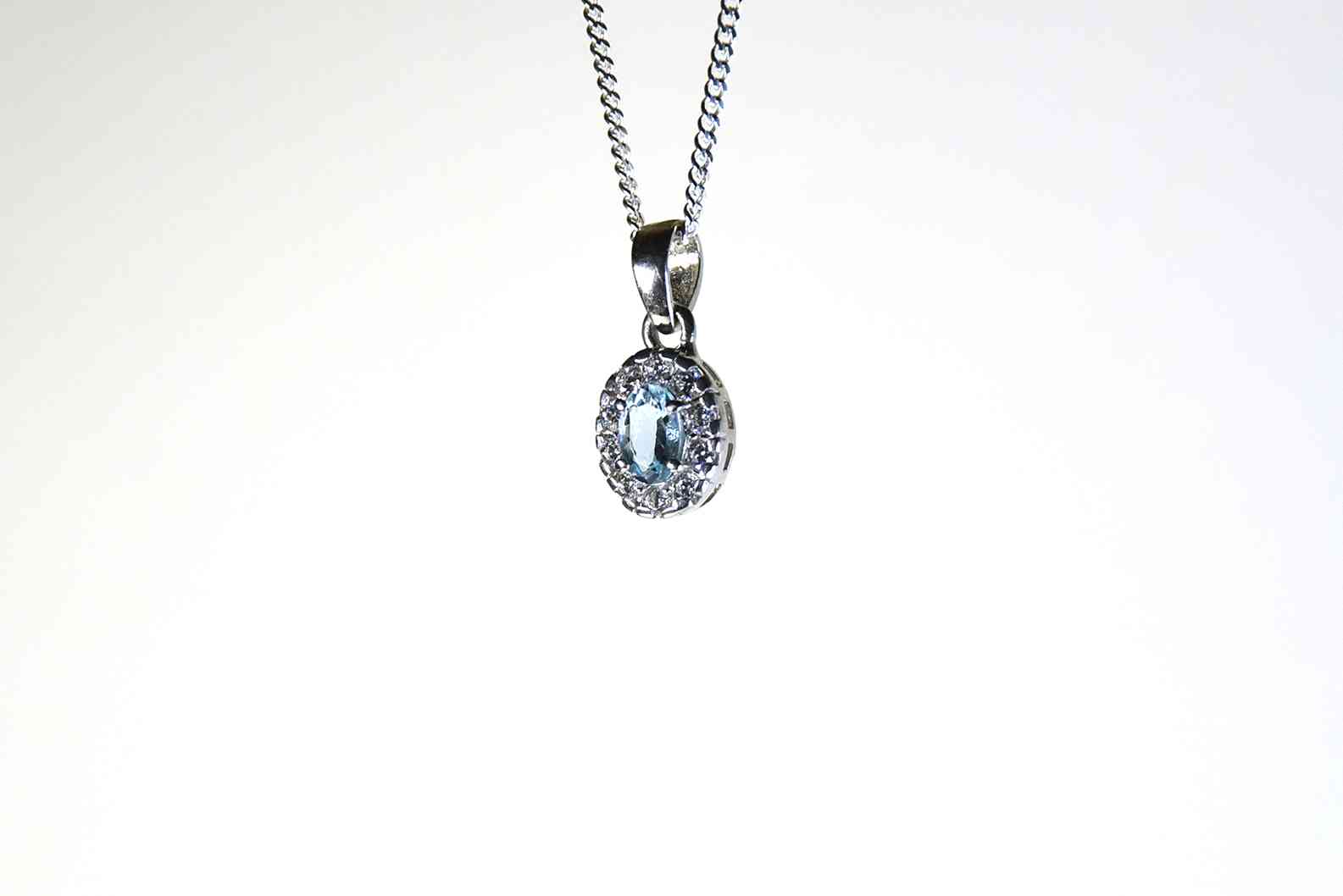 Melina Jewelry Oval Cut Aquamarine Cubic Zirconia Pendant Free Necklace